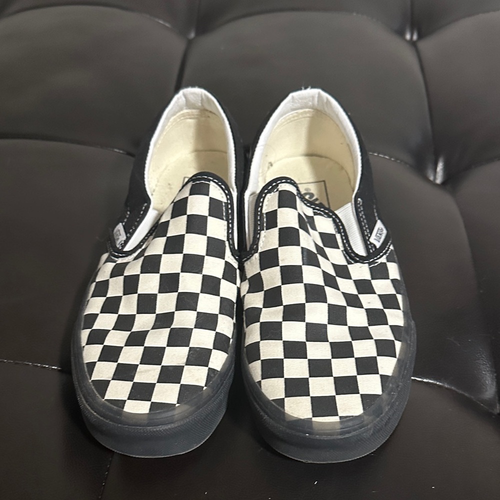 Vans women’s size 8, men’s 6.5. Slip-On Checkerboard Sneakers - Black and White